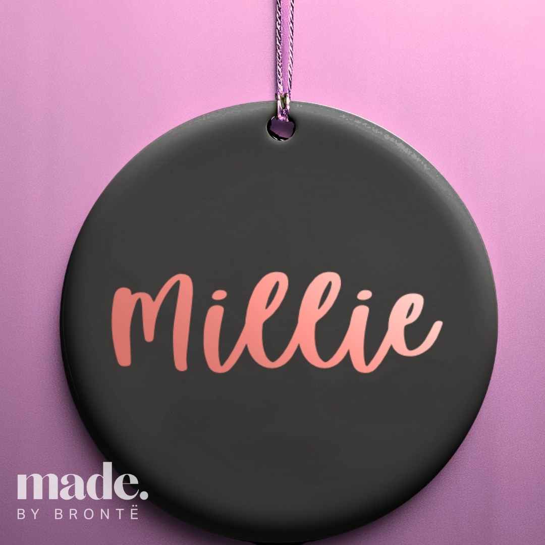 Black personalised bauble with rose gold font "Millie"